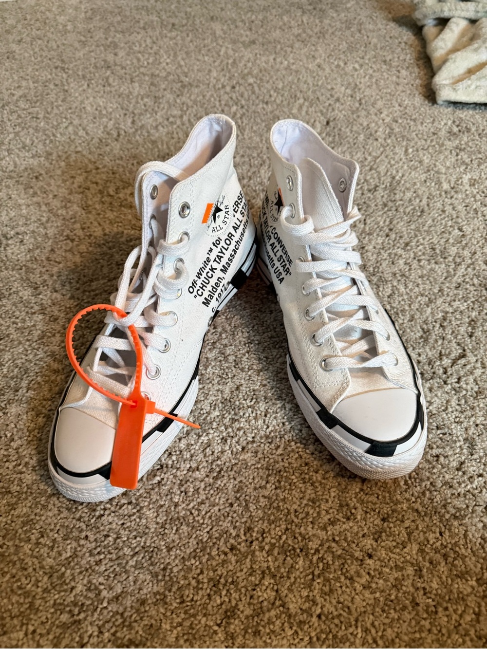 Off-White White High-Top Canvas Sneakers with Black Accents and Orange Tag